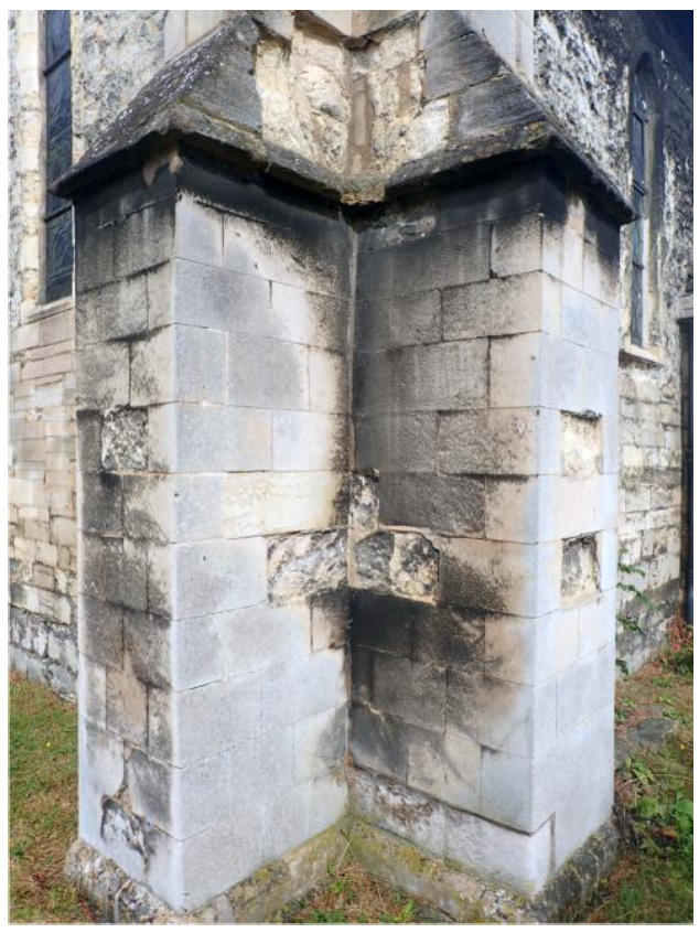 Fig. 8. Nave southwest angle buttresses. Barnack plinth and set-offs. Ketton quoins with Clunch infill, some also replaced by Ketton. Ketton probably replaces Clunch.